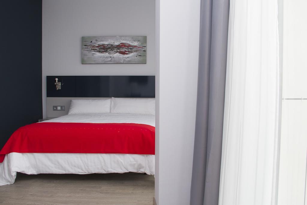 Hotel Santa Eulalia Пуертольяно Номер фото