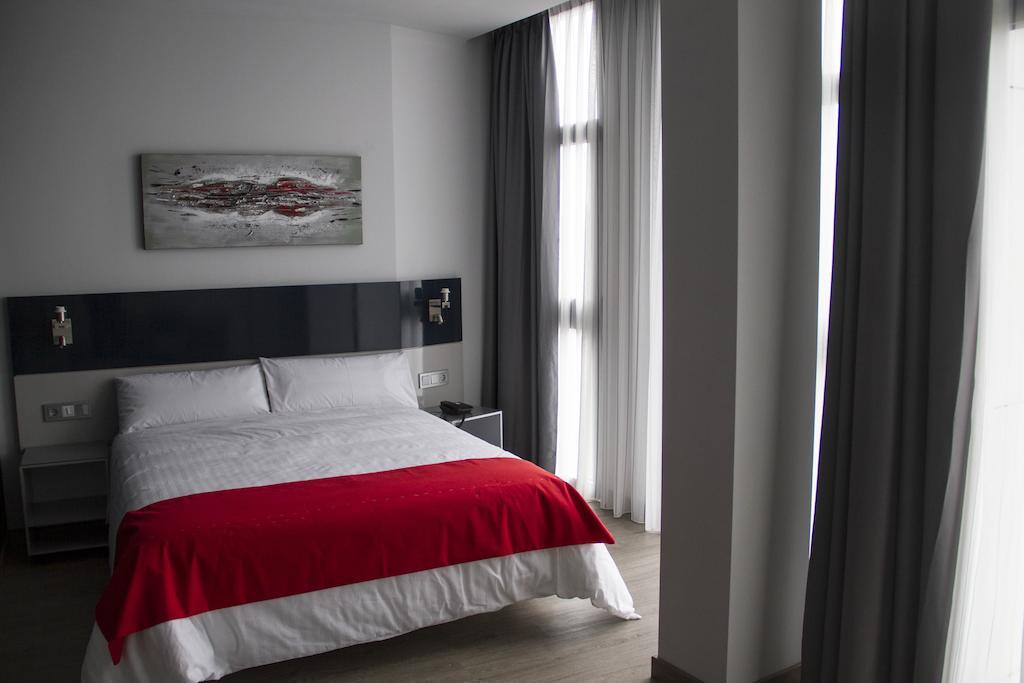 Hotel Santa Eulalia Пуертольяно Номер фото